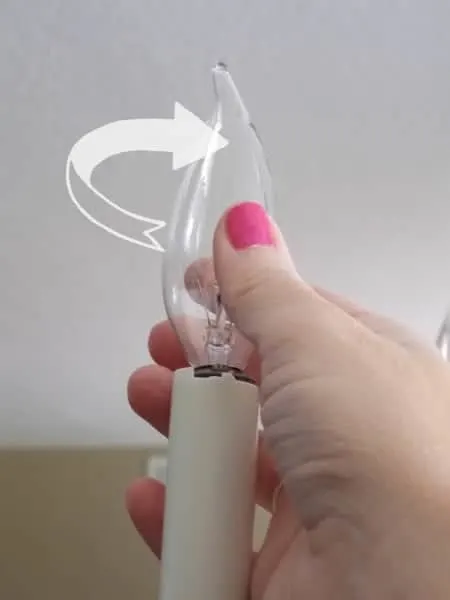 Remove bulb from chandelier candle