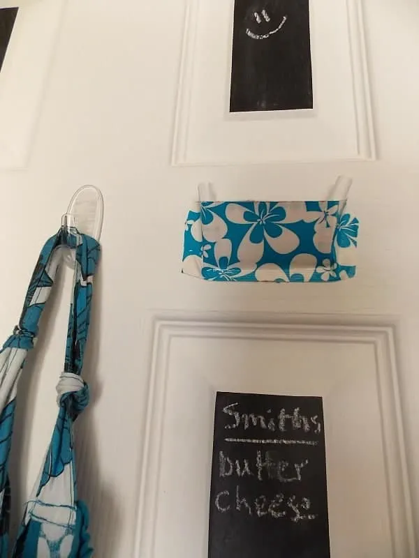 Small chalkboard on pantry door for grocery list