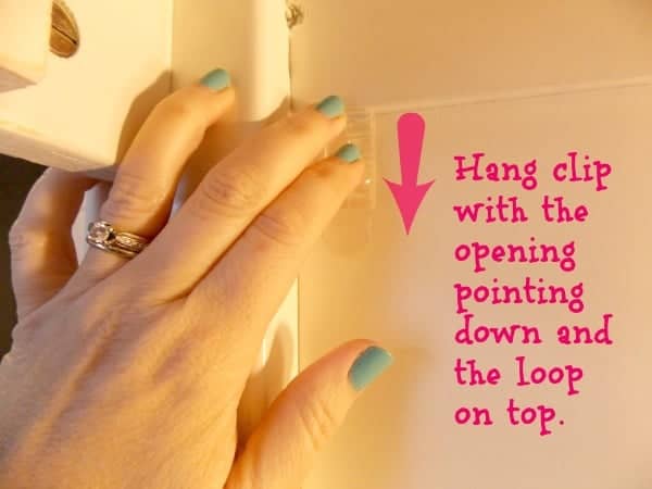 Hang clips upside down on top bunk frame