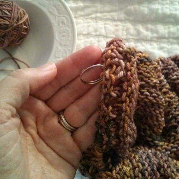 Use a stitch marker so you don't have to count each stitch.
