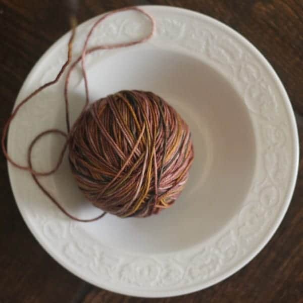 Make knitting easier on yourself by keeping your yarn ball in a bowl