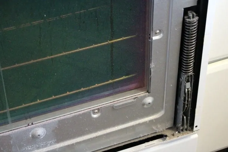 Dusty Inside of maytag oven door