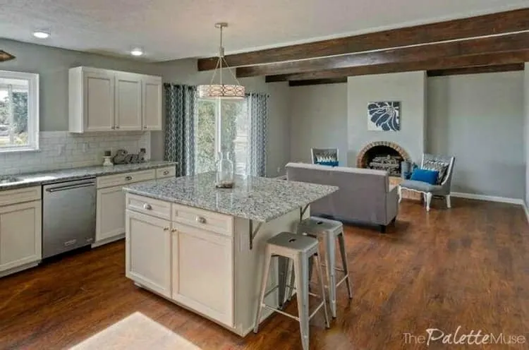 Home staging to show buyers how the living room integrates with the kitchen.
