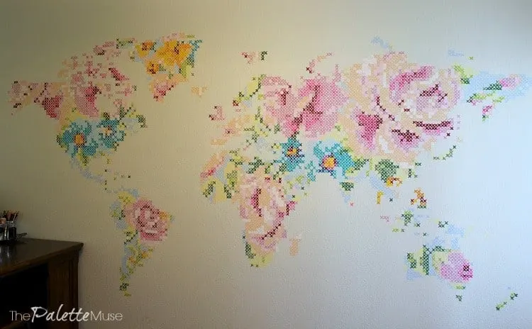 Giant mural of a colorful cross stitch floral map