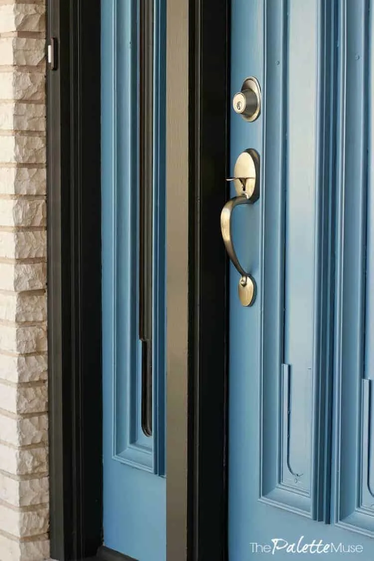Front door makeover with Curb Appeal paint and fresh hardware.