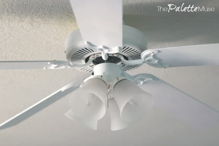 This white ceiling fan is reincarnated from a dated brass and oak monstrosity.