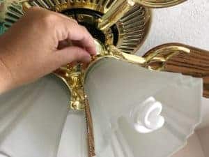 Remove light shades by loosening three screws at the top.