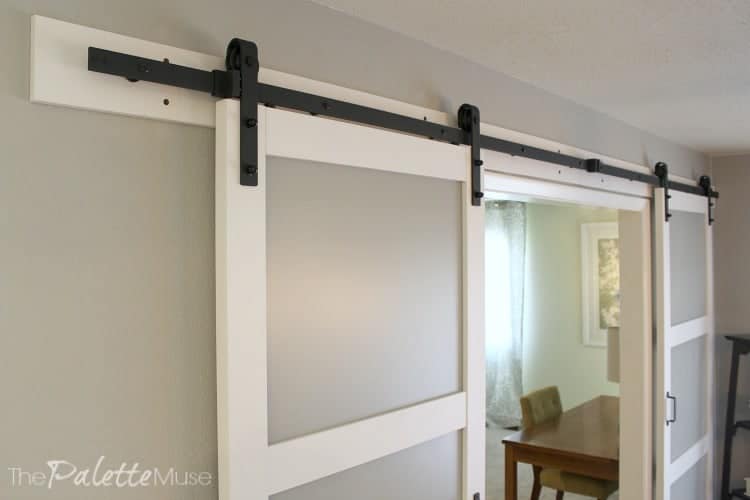 Detail of barn door's black iron header