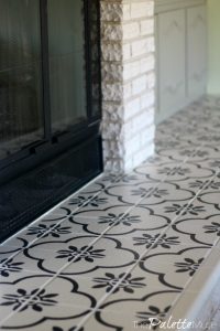 Fireplace hearth tile painted in concrete tile pattern