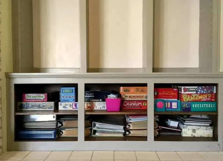 Painted bookshelves with organized contents