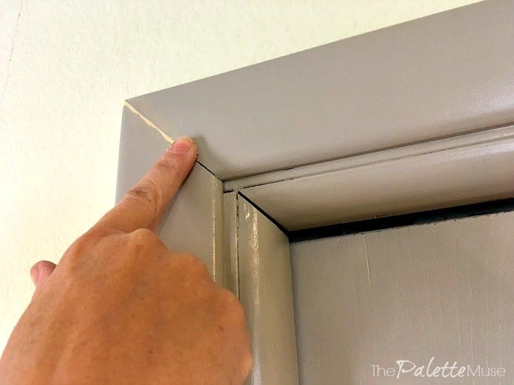 Wood filler fills in the gaps in the closet door trim.
