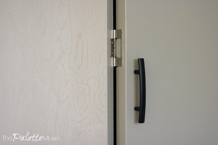 Closet doors get mixed hardware with satin nickel and oil rubbed bronze