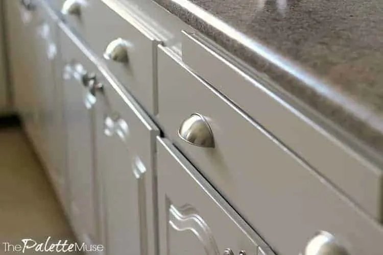 White painted kitchen cabinets with satin nickle drawer pulls