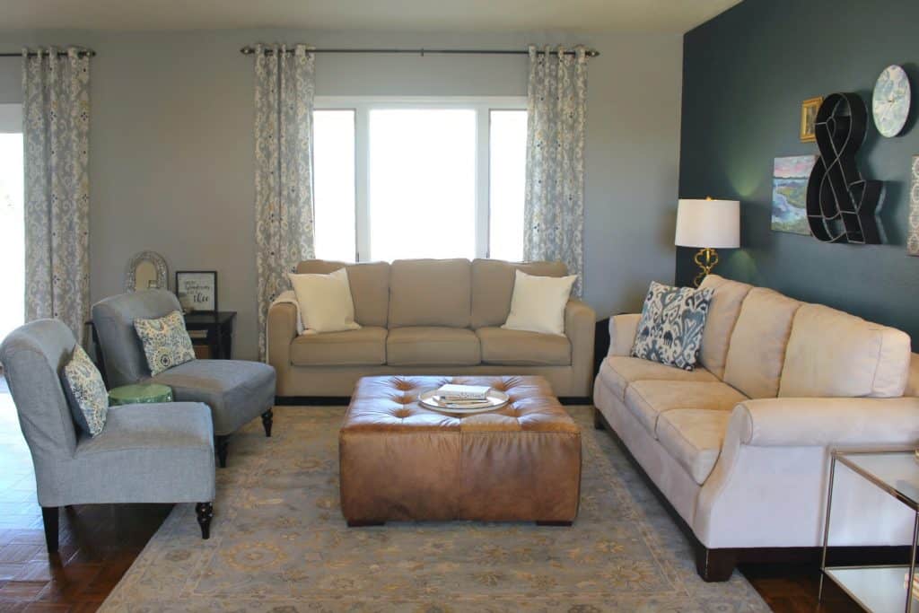 Living room with blue slipcovered chairs