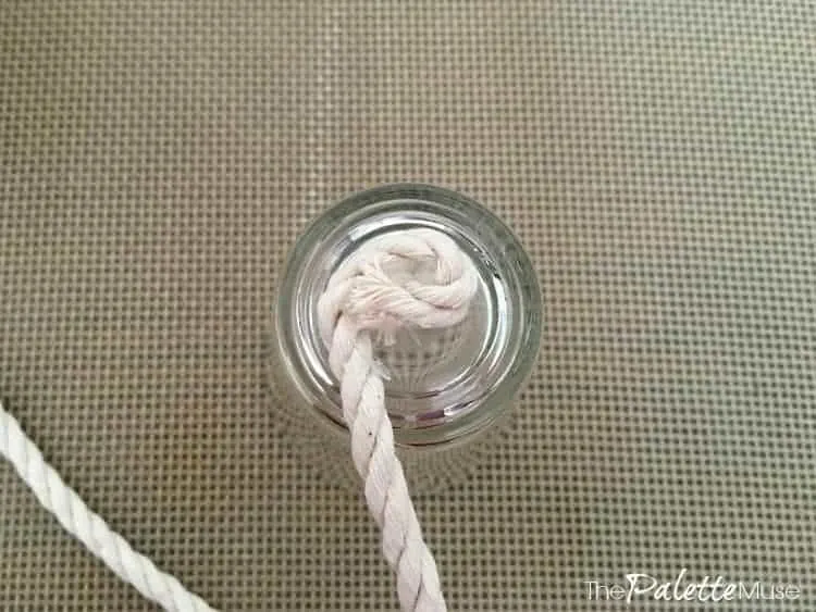 A small loop of rope glued to the bottom of a shot glass.