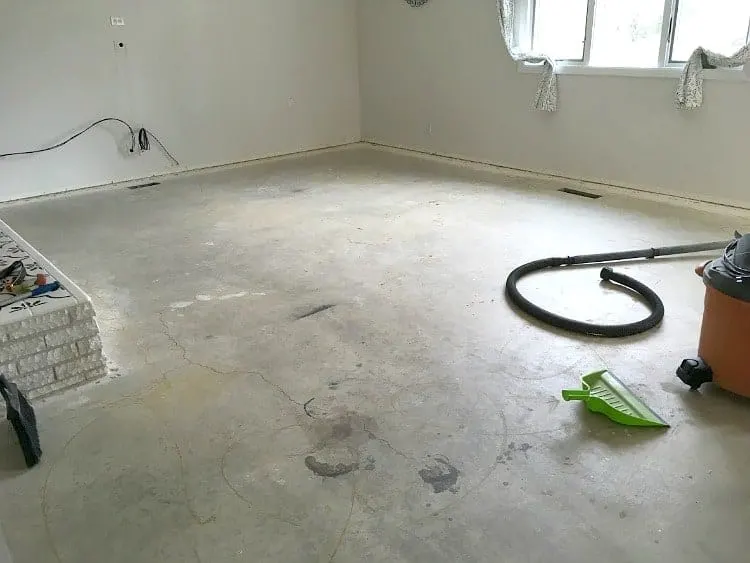 concrete subfloor cleaned up and ready for laminate flooring
