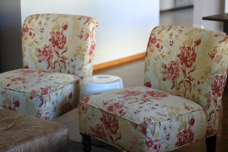 Occasional chairs in cream and antique rose pattern