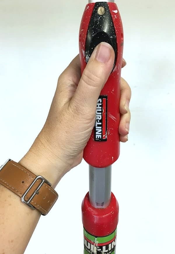One touch extendable handle for paint rollers.