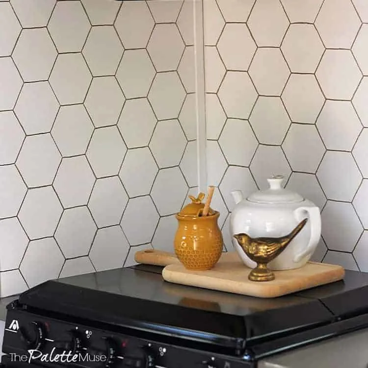 Gold hexagon pattern on white background painted backsplash