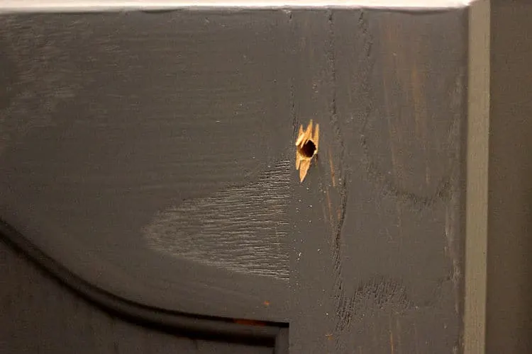 Drilling causes a little wood splintering on the back of the door