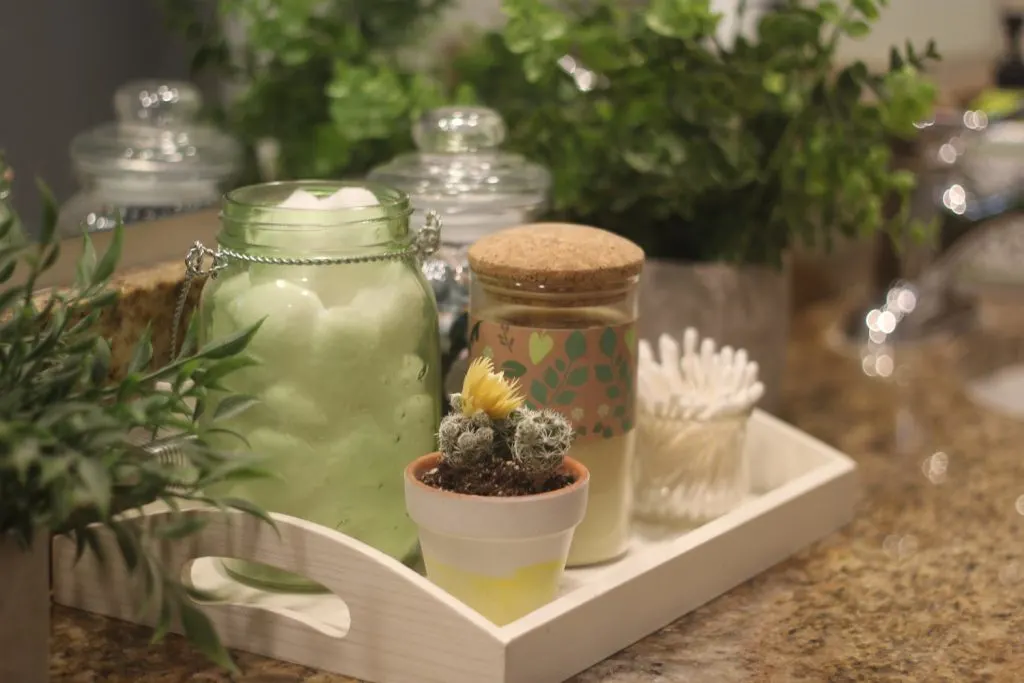 succulents and greenery centerpiece for girls bathroom makeover