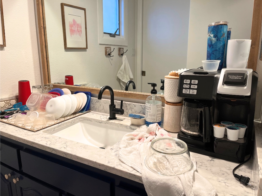 Guest bathroom set up for dishwashing and coffee making during our kitchen remodel.