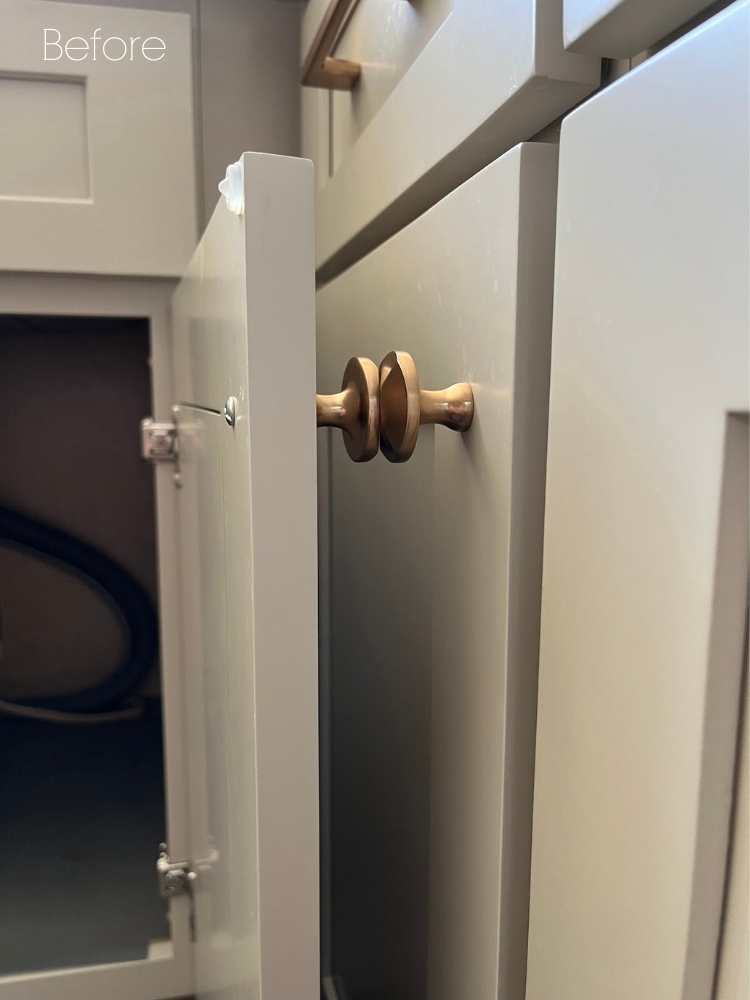 Before adding angle restrictor clips: cabinet door handles banging into each other.